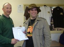 Geoff congratulates our 3000th visitor Alex Smith and presents him with souvenir T-shirt